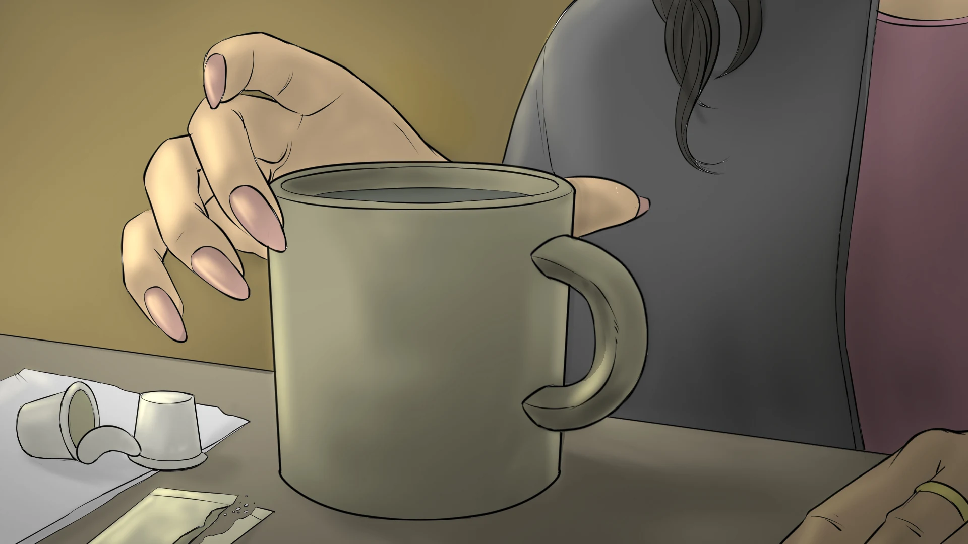 Close-up of the untouched coffee cup and her hand
